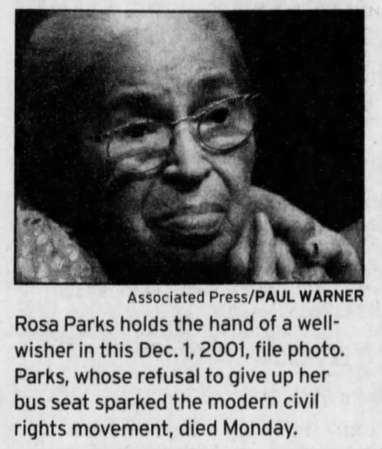 Rosa Parks holds hand of well-wisher